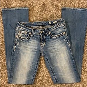 Women’s Miss Me jeans, buttons and jewels intact